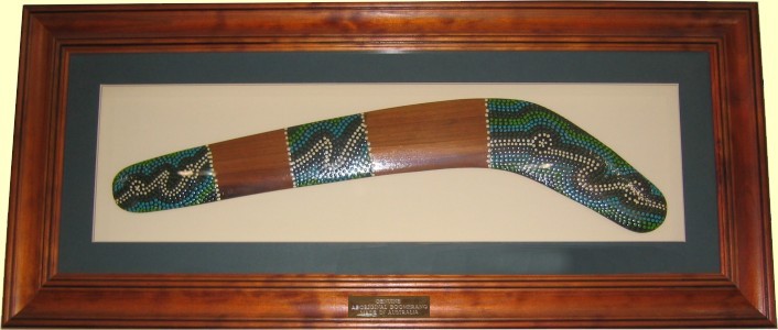 Framed killing boomerang, dot art, 22 inch. Engraved logo and text