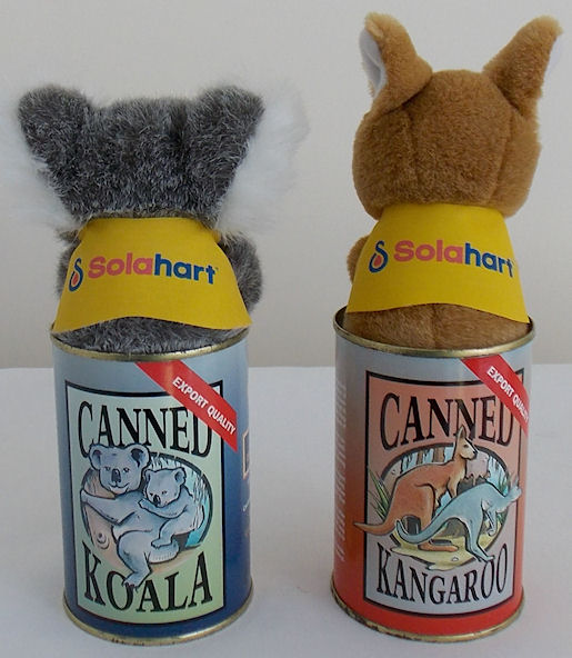 koala / kangaroo toys in corporate jackets inside sealed cans
